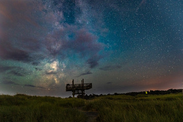 Milky way over watch tower - Powered by Adobe