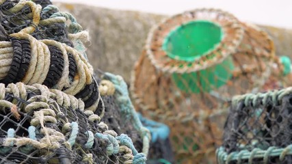 Lobster fishing pots within St Ives harbour in Cornwall, England.