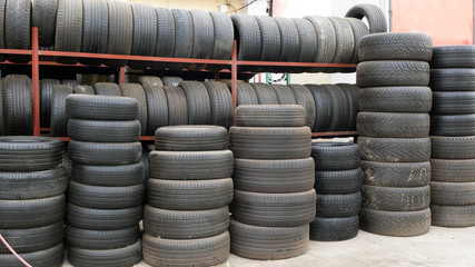 car tires in a row for sale at booth in store