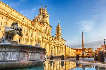 Fototapeta premium The Moor Fountain and the Fountain of Neptune and the basilica in Piazza Navona