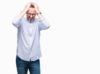 Middle age hoary senior man wearing glasses over isolated background suffering from headache desperate and stressed because pain and migraine. Hands on head.