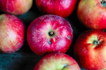 Fototapeta na wymiar Top view of red fresh apples on wooden background.