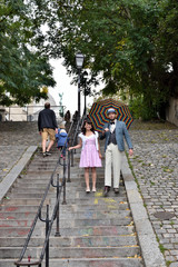 Couple walking in the stairs of Montmartre