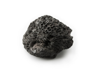 Lava stone, pumice stone, or volcanic pumice with distinctive pores, isolated on white.