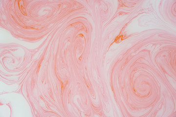 Abstract colored marble background. Stains of paint on the water.
