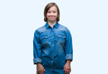 Fototapeta premium Young adult woman with down syndrome over isolated background with a happy and cool smile on face. Lucky person.