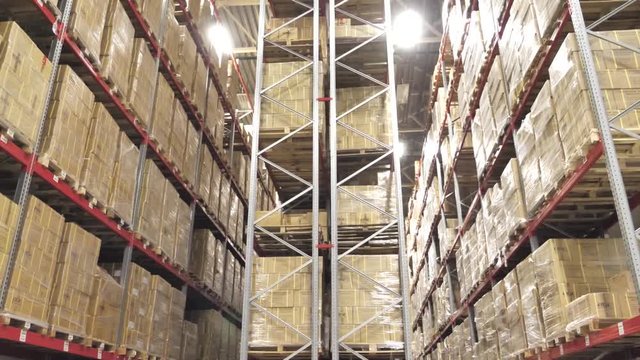Warehouse large logistics commerce structure with boxes on the shelf