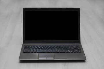 close up.open laptop with on-screen menu icons