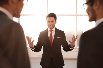 businessman makes a report for the business team