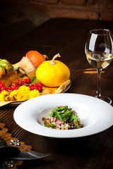 Veal Salad. Autumn composition with pumpkin. halloween