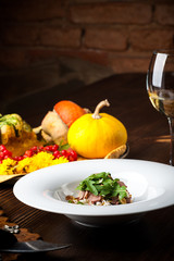 Veal Salad. Autumn composition with pumpkin. halloween