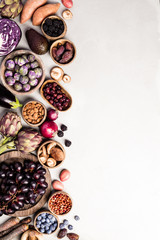 Obraz na płótnie Canvas Assortment raw organic of purple ingredients