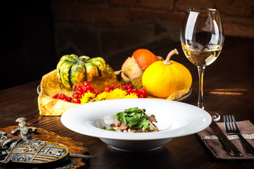 Veal Salad. Autumn composition with pumpkin. halloween