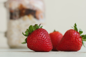 Fresh strawberry and jar with pudding. Food ingredient. Fresh berries