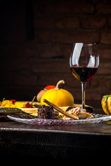 Deer steak on a black background. A Halloween Meal.