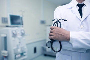 Medical care and healthcare Doctor holding a stethoscope in uniform gown