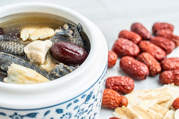 Chinese health soup - Huangqi red dates stewed black chicken