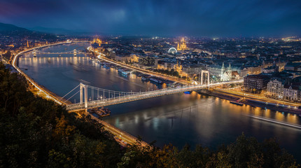 Budapest, Hungary - Aerial panoramic skyline of Budapest at blue hour. This view includes Elisabeth Bridge (Erzsebet Hid), Szechenyi Chain Bridge, Parliament and St. Stephen's Basilica