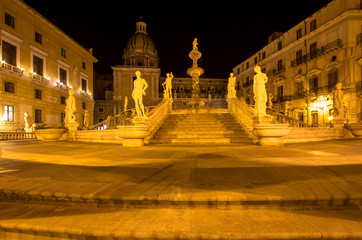 Fountain of shame on  Piazza Pretoria at night, Palermo, Italy