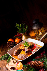 Wintry beef roulades with plum and bacon stuffing and cucumber