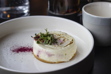 dessert on a plate on a table in a restaurant, close-up