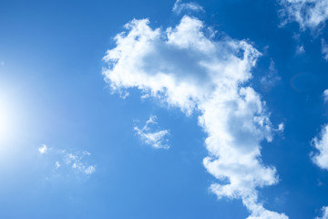 Naklejka na ściany i meble Clouds on the blue sky on sunny day