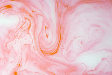 Abstract colored marble background. Stains of paint on the water.