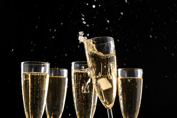Glasses of champagne with splash