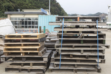 stacks of old wood pallets