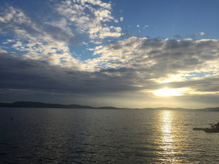 Obraz premium Adriatic Sea coast. Sunset with clouds.