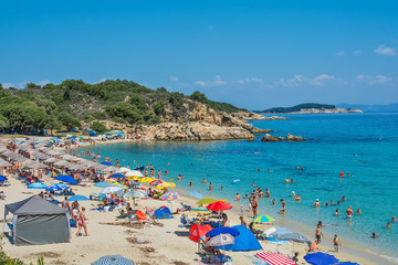 Naklejka premium Olympiada, Greece - August 18, 2018: Proti Ammoudia beach, one of the most beautiful beaches in the Aegean Sea.
