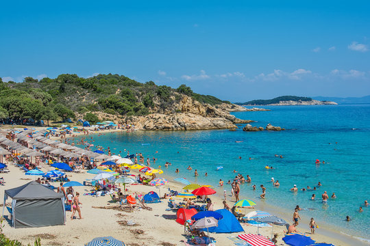Olympiada, Greece - August 18, 2018: Proti Ammoudia beach, one of the most beautiful beaches in the Aegean Sea.