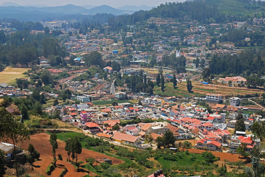 Aerial view of the town of Udagamandalam in Tamil Nadu, India. Also known as Ooty, it is a leading center of the tea growing industry in the region