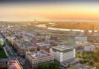 Fototapeta na wymiar Belgrade downtown, Ada, Gazela bridges, Sava River Waterfront by dusk aerial panorama