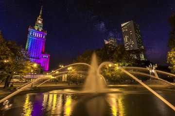 Fototapeta premium Culture Palace and Sciences in Warsaw Center by Night - one of the main travel attraction of the capital