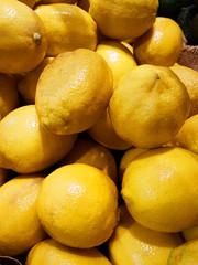 fresh lemons on sale at a local market