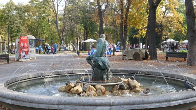 Fountain The Struggle (Borba) or The man with the snake or Fisherman Fountain on Belgrade Kalemegdan Fortress. The bronze sculpture made by sculptor Simeon Roksandic. Belgrade 21 October 2017