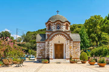 Olympiada, Greece - August 18, 2018: St. Nicholas church at the beach of the town Olympiada in Chalkidiki in Greece