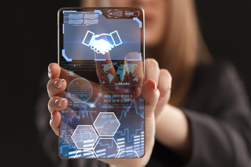 The concept of business, technology, the Internet and the network. A young entrepreneur working on a virtual screen of the future and sees the inscription: