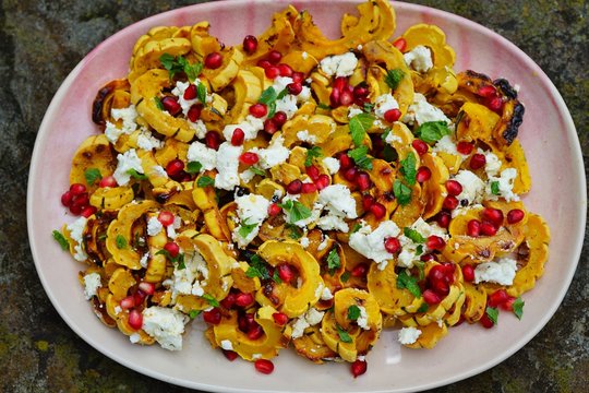 Roasted Delicata Squash Salad With Goat Cheese And Pomegranate In The Fall