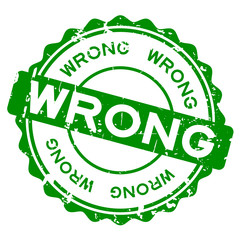 Grunge green wrong word round rubber seal stamp on white background
