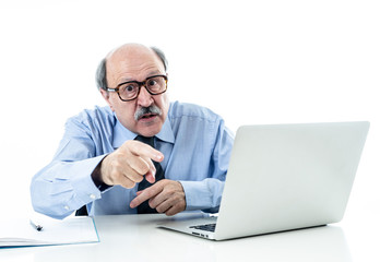 Angry older boss at work yelling and arguing at office