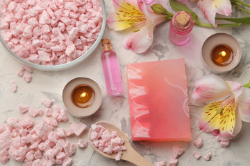 Plakat Spa composition with handmade soap, aroma oils and sea salt. spa concept. on a light background. top view