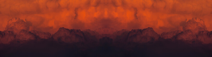 Abstract panoramic of a red cloudy sunset after a huge forest fire.
