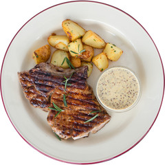 Steak with potatoes and sauce
