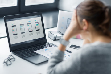 app design, technology and failure concept - stressed web designer with user interface layout on...