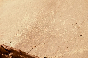 Prehistoric rock painting in the sand desert Wadi Rum, Jordan.