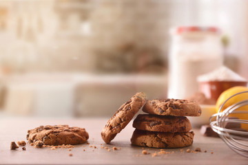 Homemade cookies with chocolate chips on wooden table rustic front