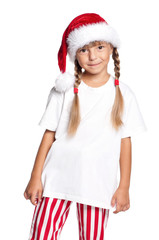 Portrait of happy little girl in Santa hat isolated on white background