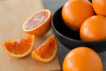 food, fruits and healthy eating concept -close up of fresh juicy blood oranges